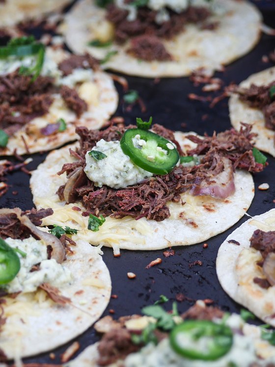 Tacos going together on the griddle