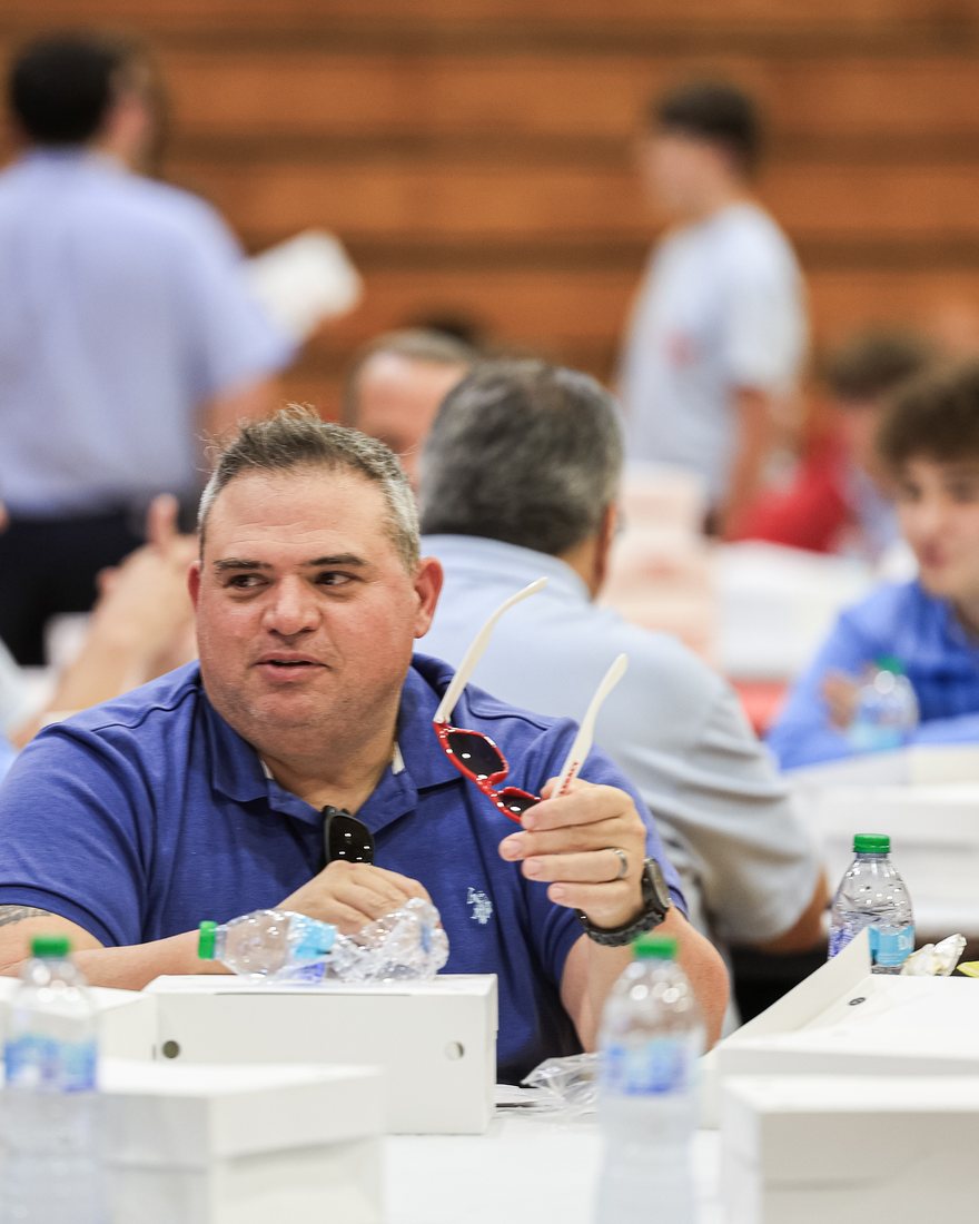 An alumnus at his table during the lunch