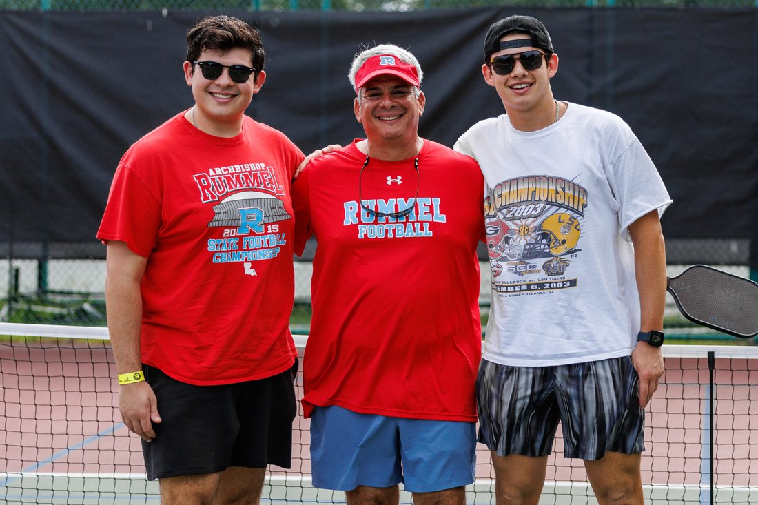 Raiders at the net during the alumni pickleball tournament