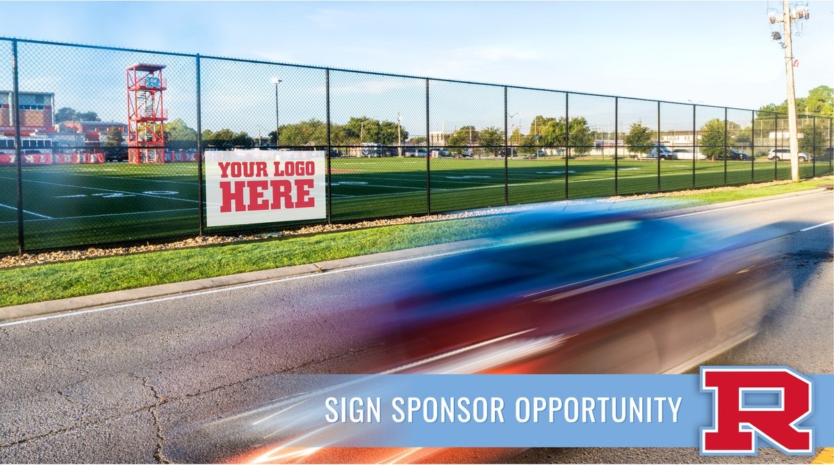 A sponsor sign reading Your Logo Here on the fence along the Rummel field, seen from the street