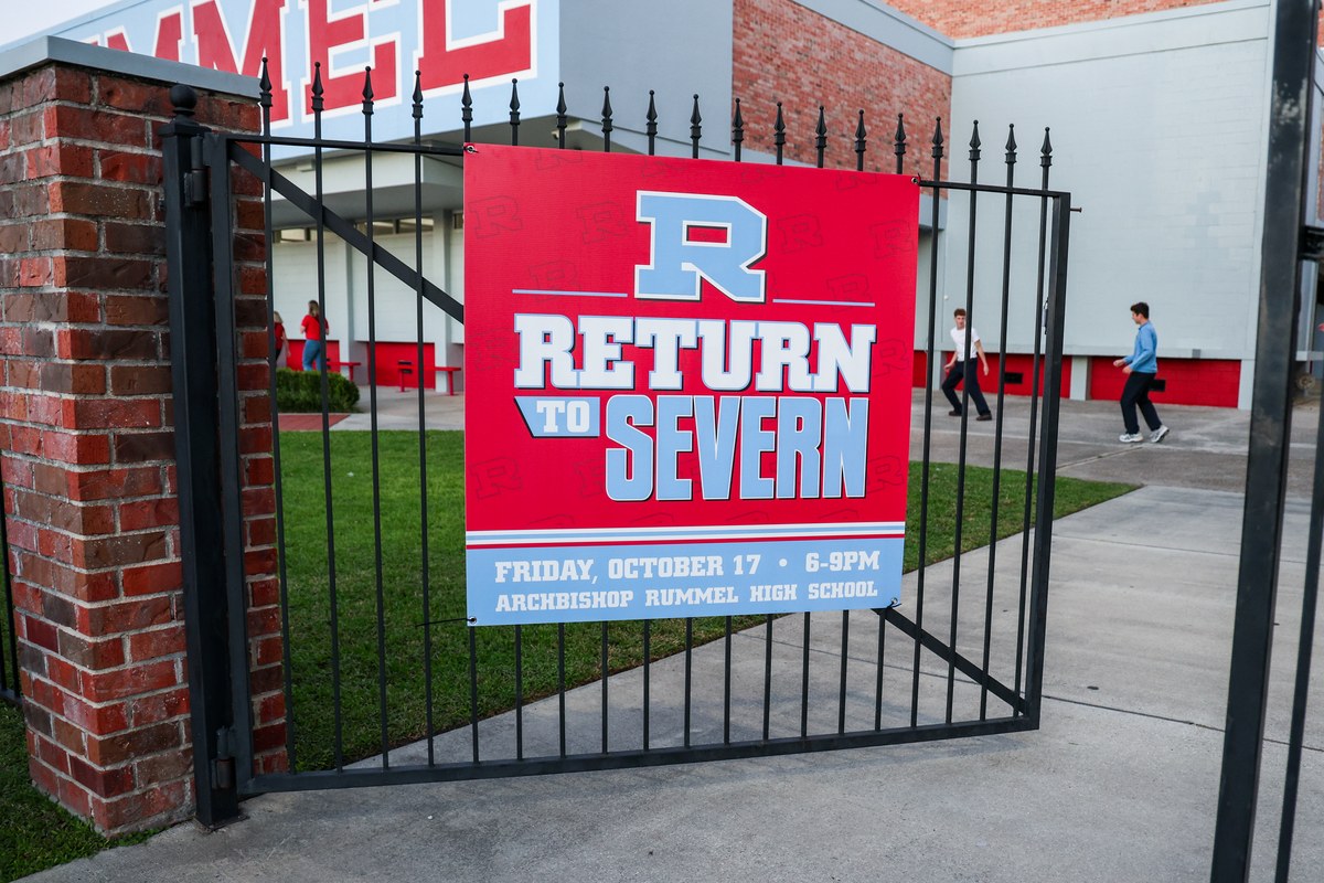 The Return to Severn sign at the campus gate on the night of the event
