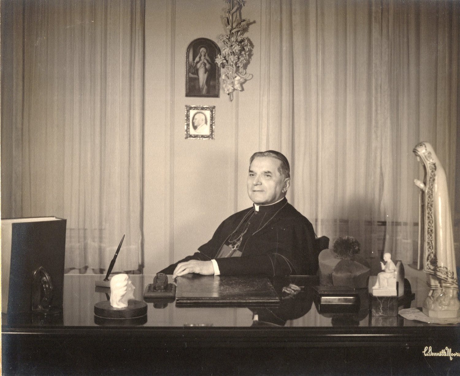 Archbishop Rummel working at his desk